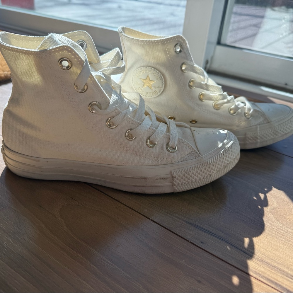 White/gold high top converse